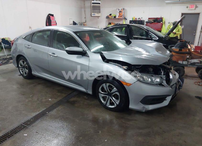 2018 Honda Civic LX (VIN 19XFC2F55JE003789) main photo