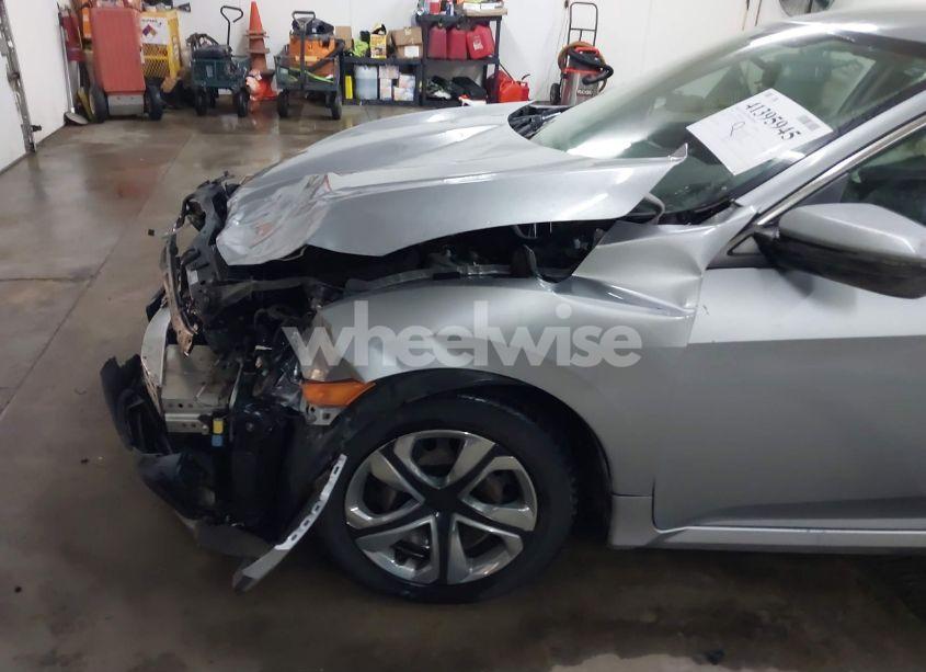 Photo 20 of 2018 Honda Civic LX (VIN 19XFC2F55JE003789)