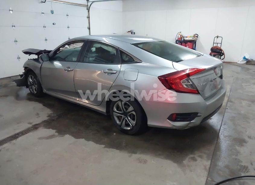 Photo 3 of 2018 Honda Civic LX (VIN 19XFC2F55JE003789)