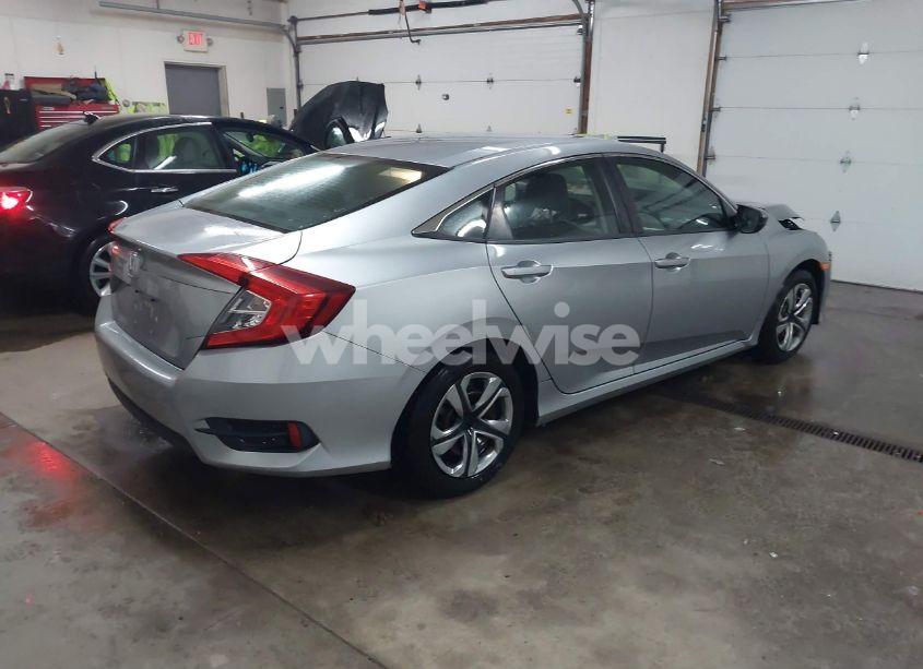 Photo 4 of 2018 Honda Civic LX (VIN 19XFC2F55JE003789)