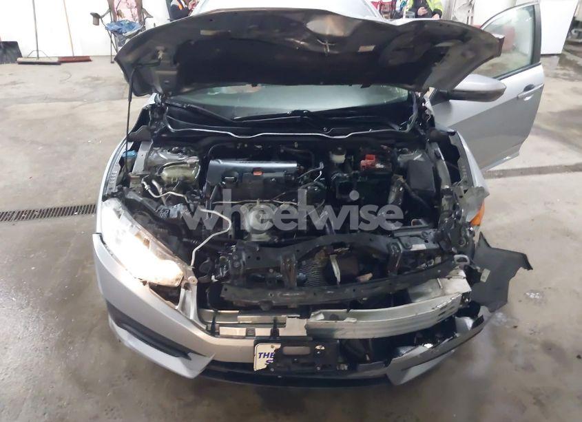 Photo 6 of 2018 Honda Civic LX (VIN 19XFC2F55JE003789)