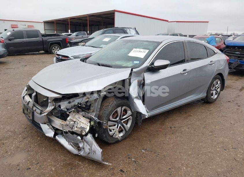 Photo 2 of 2018 Honda Civic LX (VIN 19XFC2F55JE008247)