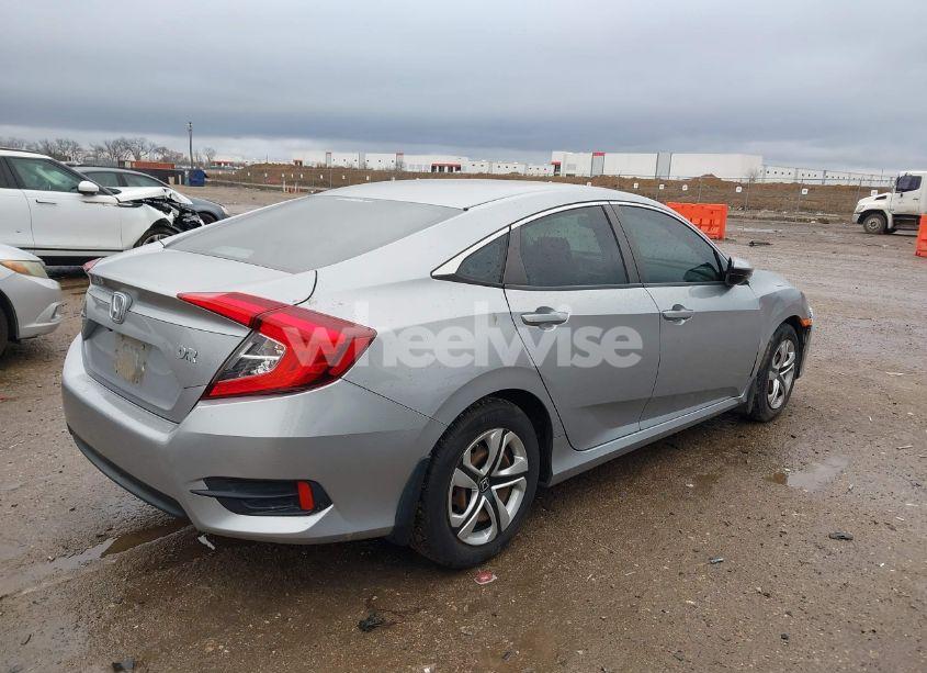 Photo 4 of 2018 Honda Civic LX (VIN 19XFC2F55JE008247)