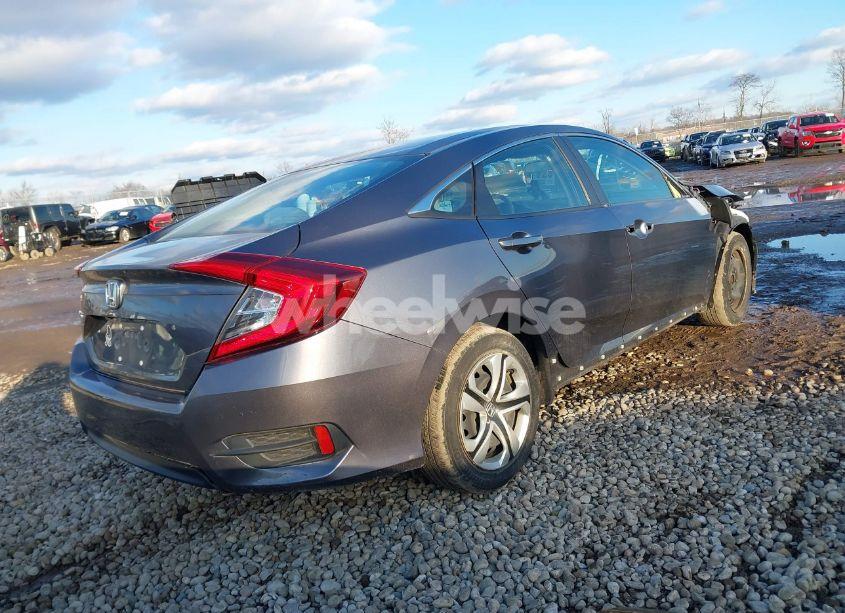 Photo 4 of 2018 Honda Civic LX (VIN 19XFC2F55JE025114)