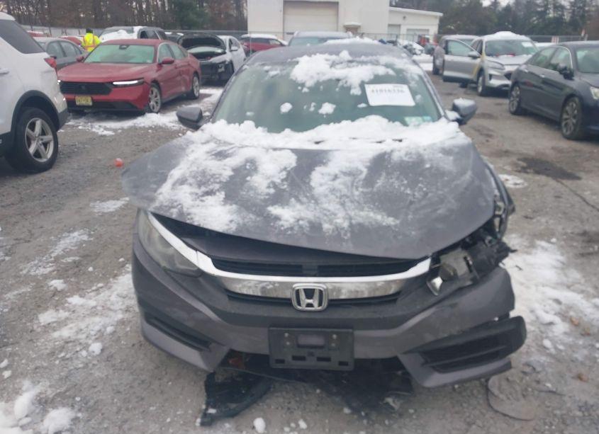 Photo 6 of 2018 Honda Civic LX (VIN 19XFC2F55JE203197)