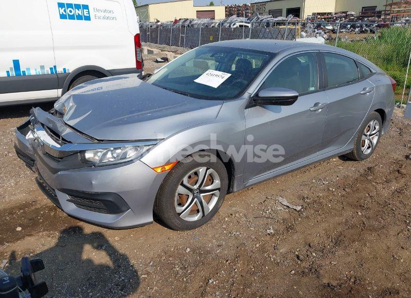 Photo 2 of 2017 Honda Civic LX (VIN 19XFC2F56HE010325)