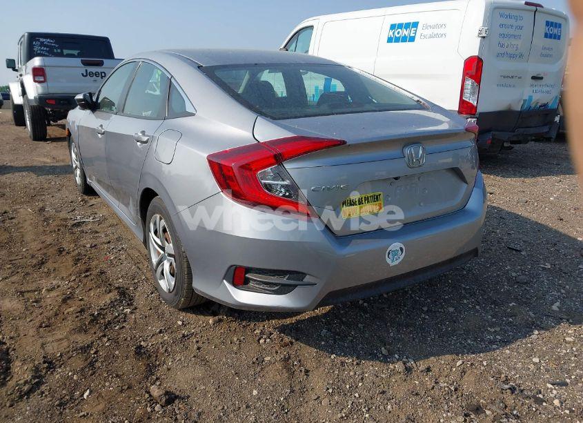 Photo 3 of 2017 Honda Civic LX (VIN 19XFC2F56HE010325)
