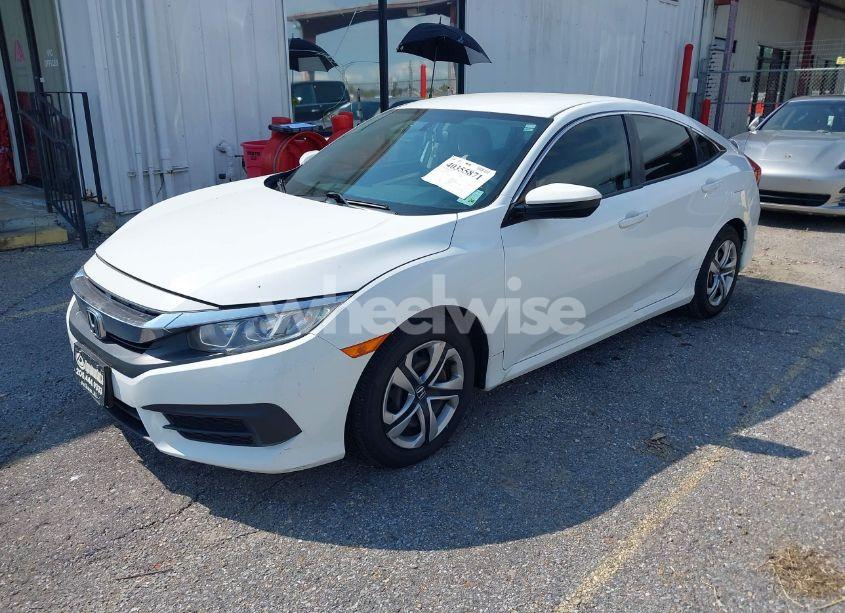 Photo 2 of 2017 Honda Civic LX (VIN 19XFC2F56HE015329)