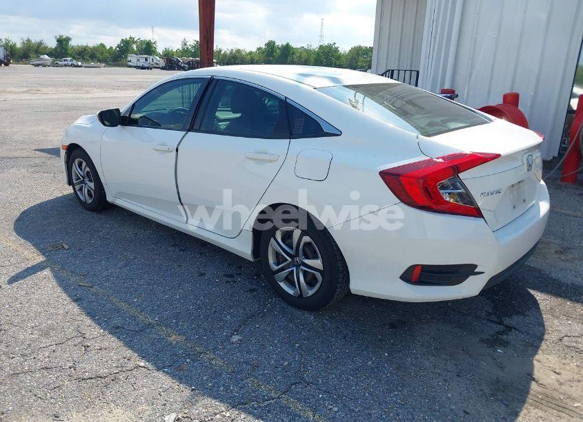 Photo 3 of 2017 Honda Civic LX (VIN 19XFC2F56HE015329)