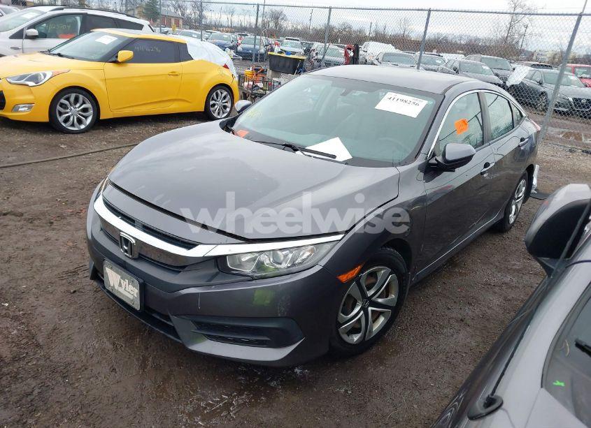 Photo 2 of 2017 Honda Civic LX (VIN 19XFC2F56HE028453)