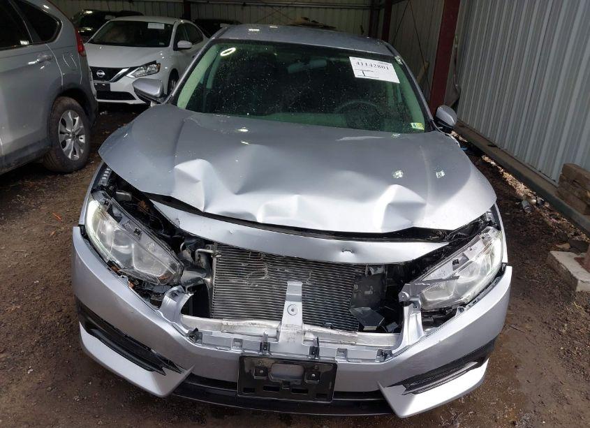 Photo 6 of 2017 Honda Civic LX (VIN 19XFC2F56HE050775)