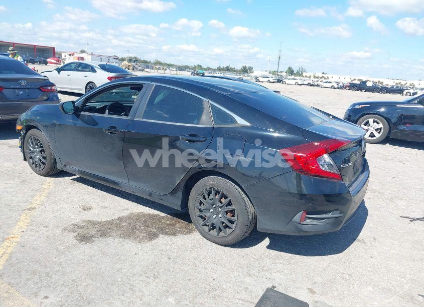 Photo 3 of 2017 Honda Civic LX (VIN 19XFC2F56HE051652)