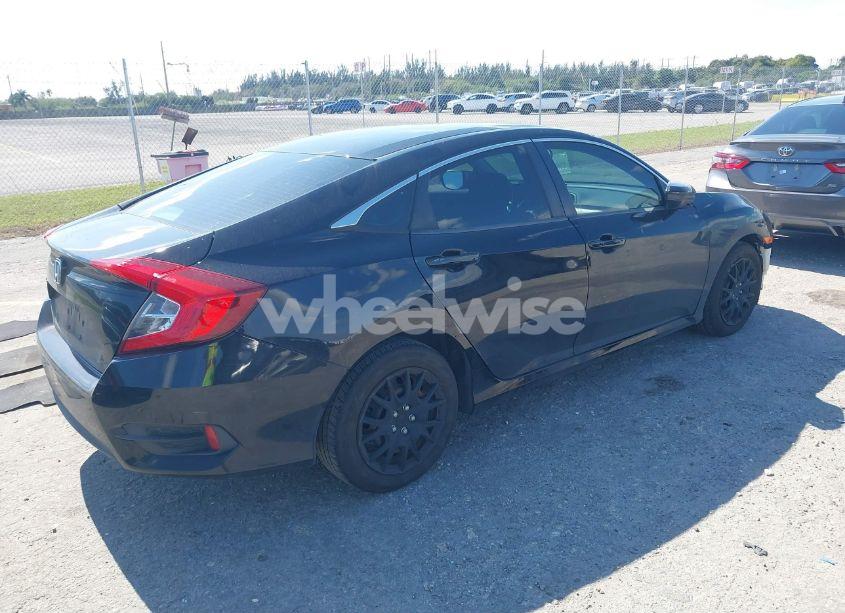 Photo 4 of 2017 Honda Civic LX (VIN 19XFC2F56HE051652)