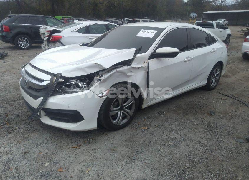 Photo 2 of 2017 Honda Civic LX (VIN 19XFC2F56HE203896)