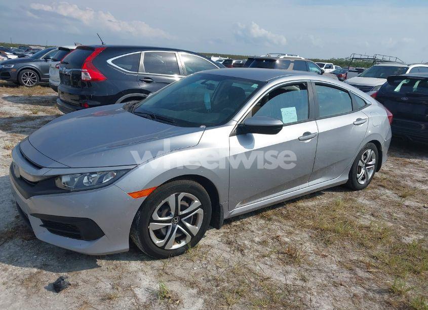 Photo 2 of 2018 Honda Civic LX (VIN 19XFC2F56JE000416)