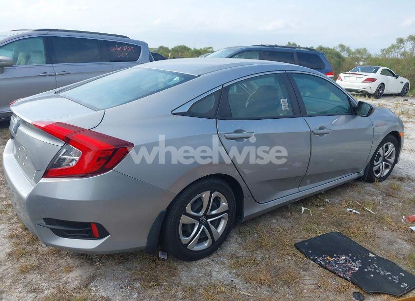 Photo 4 of 2018 Honda Civic LX (VIN 19XFC2F56JE000416)