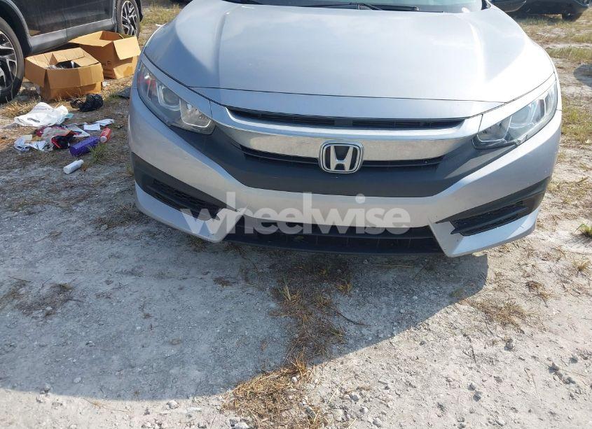 Photo 6 of 2018 Honda Civic LX (VIN 19XFC2F56JE000416)