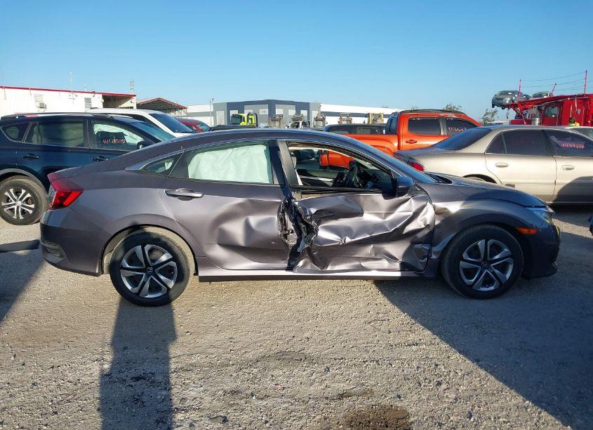 Photo 13 of 2018 Honda Civic LX (VIN 19XFC2F56JE005390)