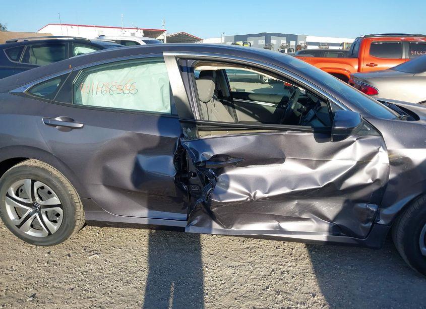 Photo 6 of 2018 Honda Civic LX (VIN 19XFC2F56JE005390)