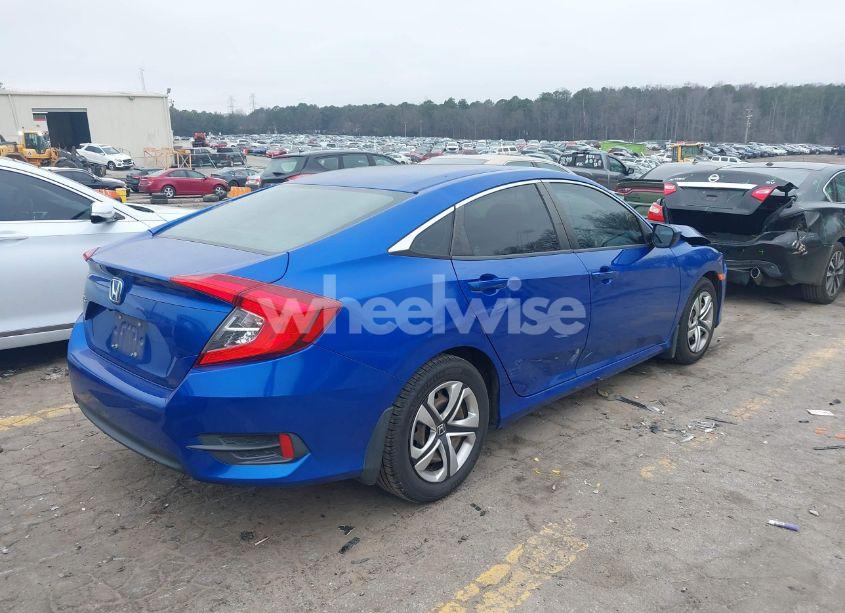 Photo 4 of 2018 Honda Civic LX (VIN 19XFC2F56JE006751)