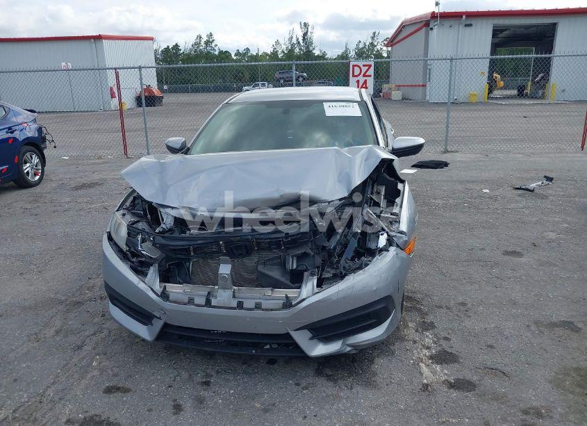 Photo 12 of 2018 Honda Civic LX (VIN 19XFC2F56JE008922)