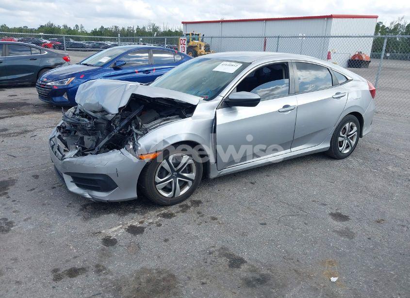 Photo 2 of 2018 Honda Civic LX (VIN 19XFC2F56JE008922)