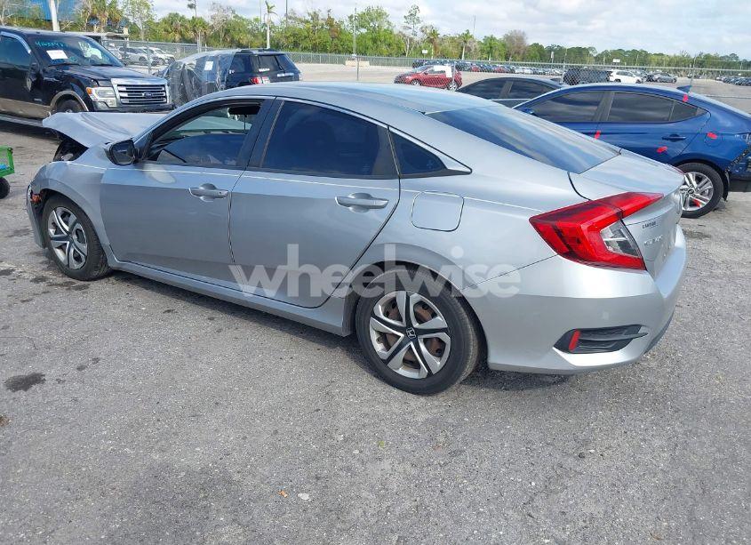 Photo 3 of 2018 Honda Civic LX (VIN 19XFC2F56JE008922)