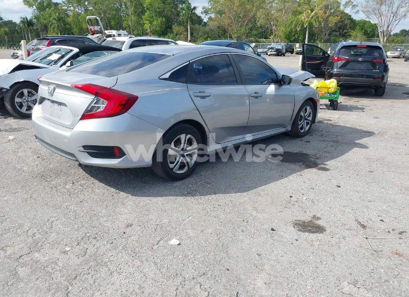 Photo 4 of 2018 Honda Civic LX (VIN 19XFC2F56JE008922)