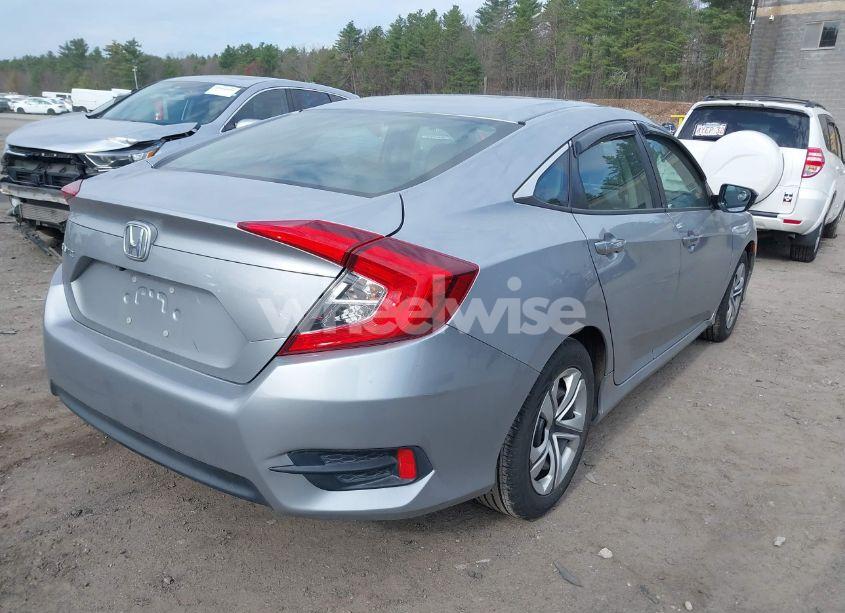 Photo 4 of 2018 Honda Civic LX (VIN 19XFC2F56JE201460)