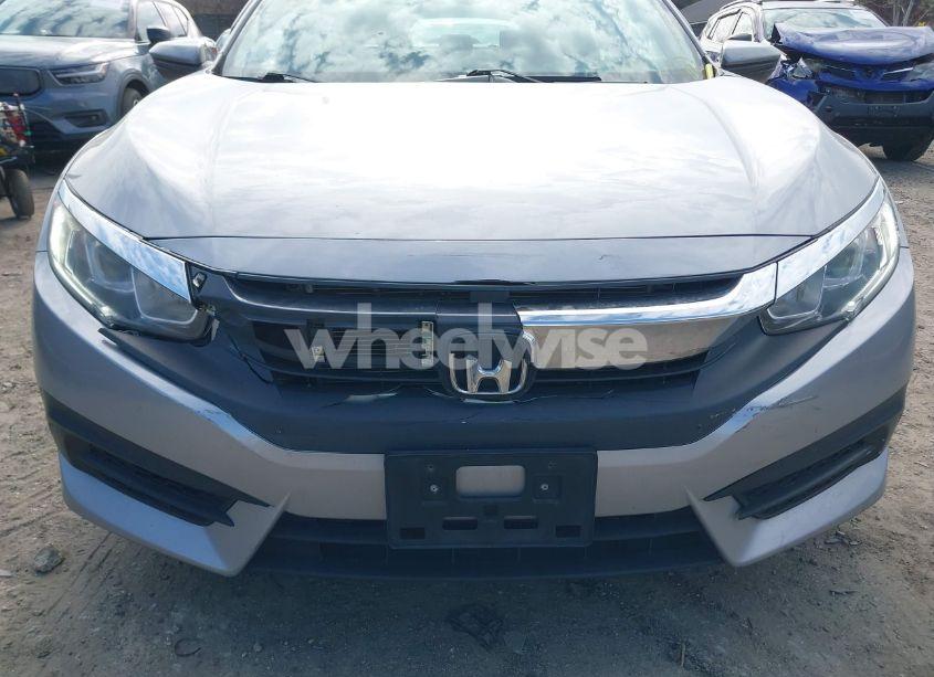 Photo 6 of 2018 Honda Civic LX (VIN 19XFC2F56JE201460)