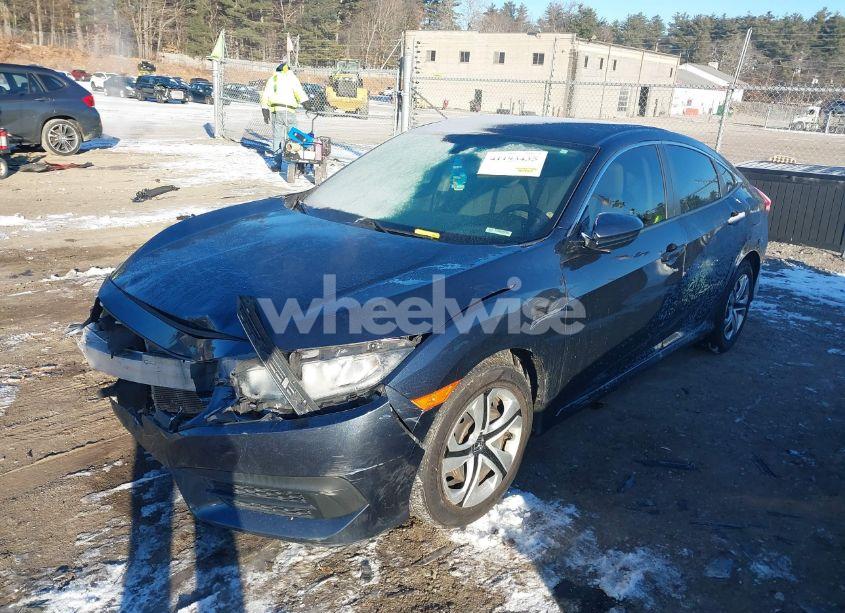 Photo 2 of 2018 Honda Civic LX (VIN 19XFC2F56JE201877)