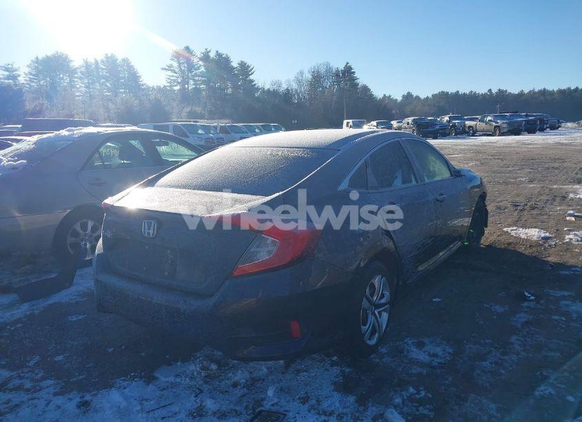 Photo 4 of 2018 Honda Civic LX (VIN 19XFC2F56JE201877)