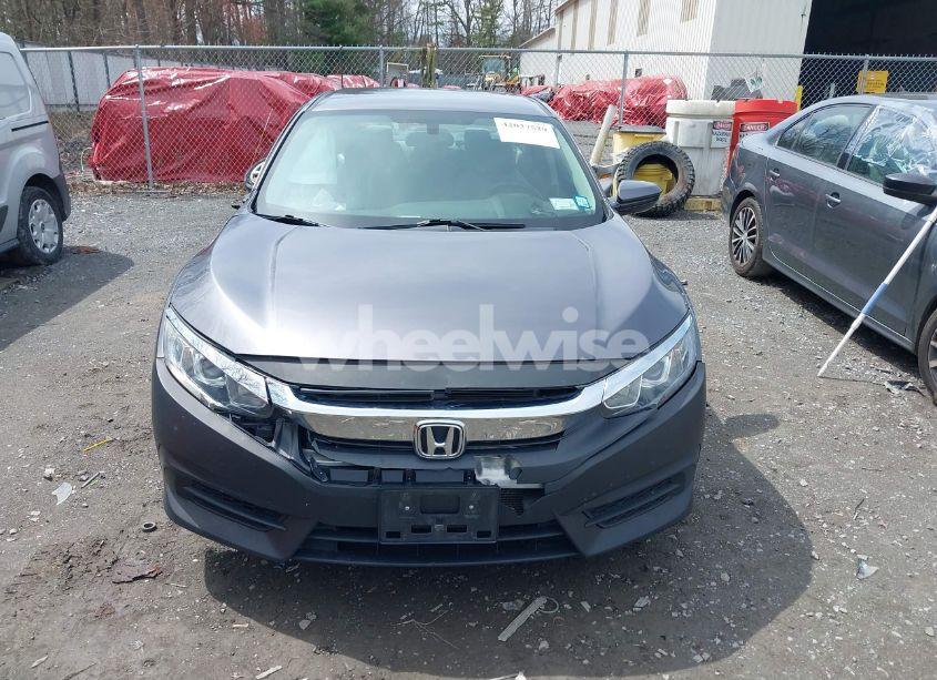 Photo 12 of 2018 Honda Civic LX (VIN 19XFC2F56JE204147)