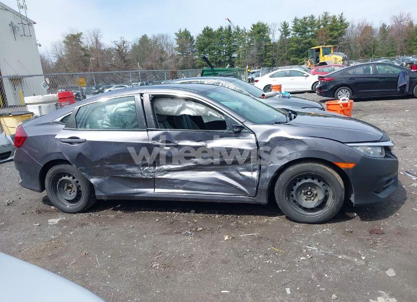 Photo 13 of 2018 Honda Civic LX (VIN 19XFC2F56JE204147)