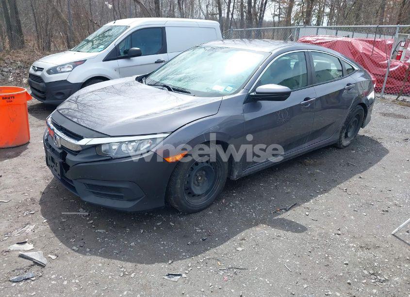 Photo 2 of 2018 Honda Civic LX (VIN 19XFC2F56JE204147)