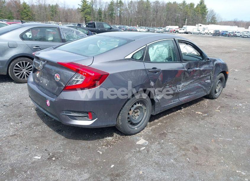 Photo 4 of 2018 Honda Civic LX (VIN 19XFC2F56JE204147)