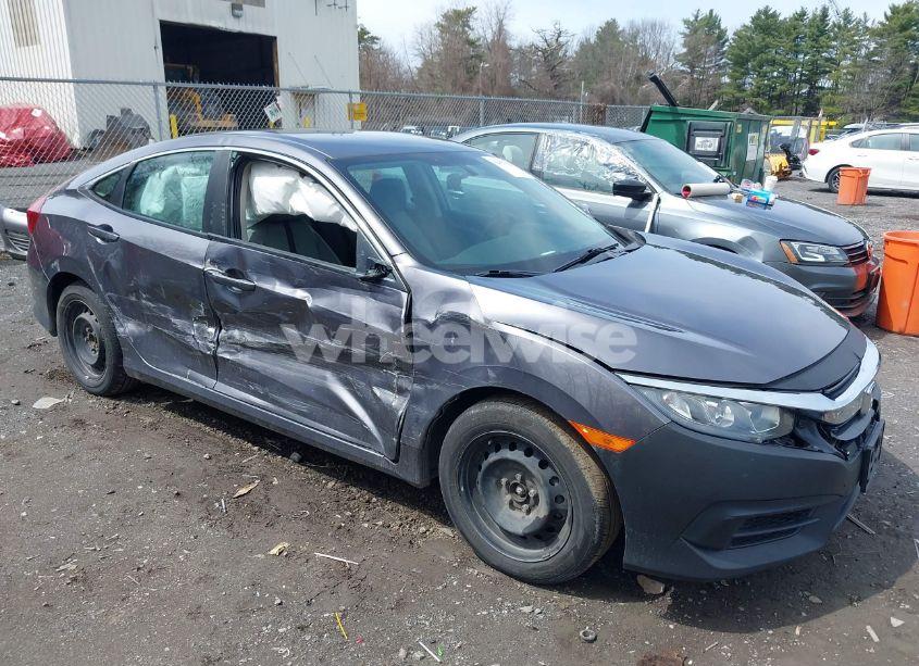 Photo 6 of 2018 Honda Civic LX (VIN 19XFC2F56JE204147)