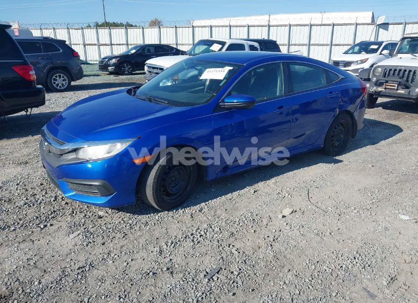 Photo 2 of 2017 Honda Civic LX (VIN 19XFC2F57HE008907)
