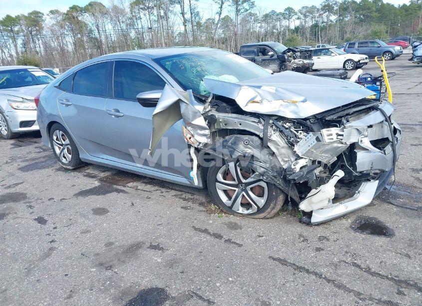 2017 Honda Civic LX (VIN 19XFC2F57HE010432) main photo