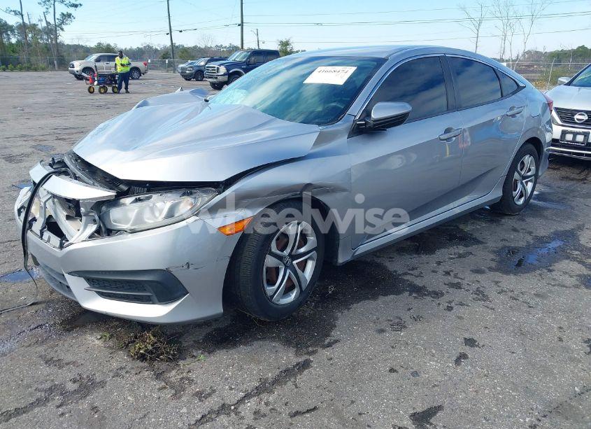 Photo 2 of 2017 Honda Civic LX (VIN 19XFC2F57HE010432)
