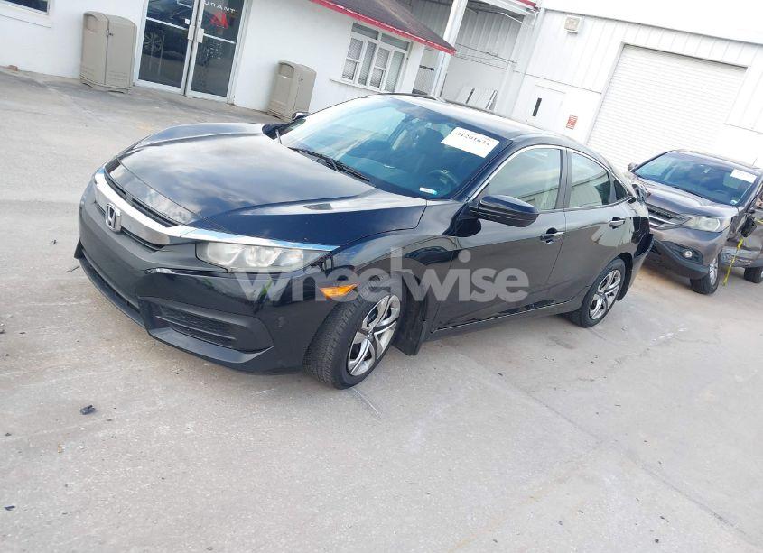 Photo 2 of 2017 Honda Civic LX (VIN 19XFC2F57HE016683)
