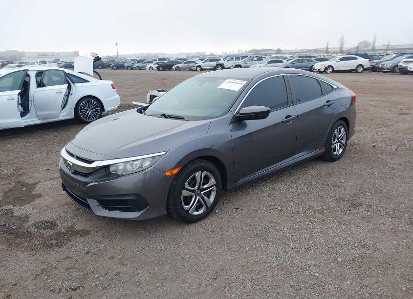 Photo 2 of 2017 Honda Civic LX (VIN 19XFC2F57HE017137)