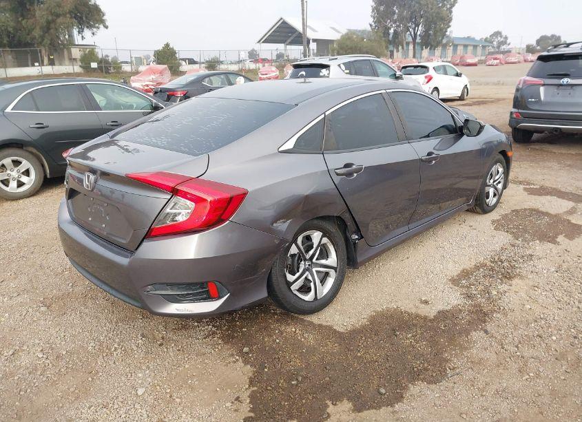 Photo 4 of 2017 Honda Civic LX (VIN 19XFC2F57HE017137)