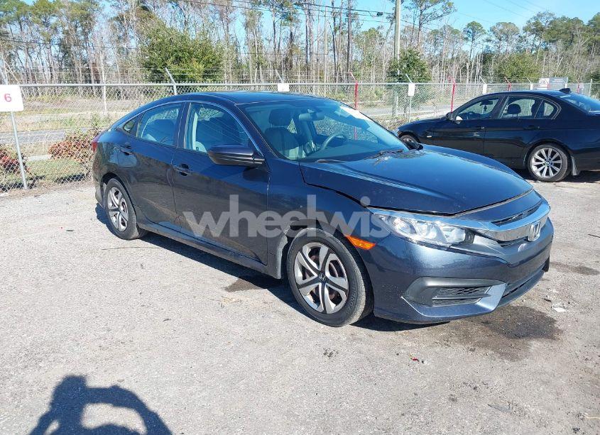 2017 Honda Civic LX (VIN 19XFC2F57HE027439) main photo