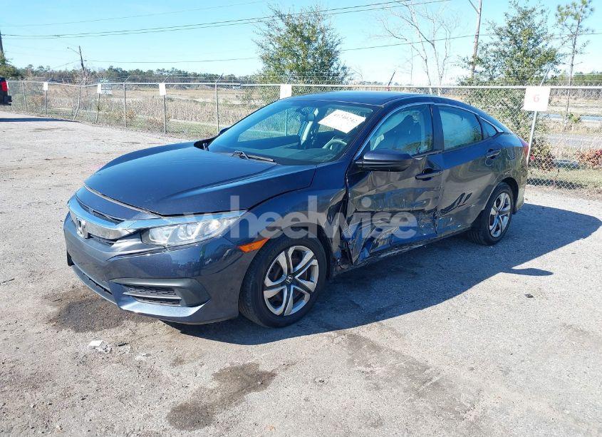 Photo 2 of 2017 Honda Civic LX (VIN 19XFC2F57HE027439)