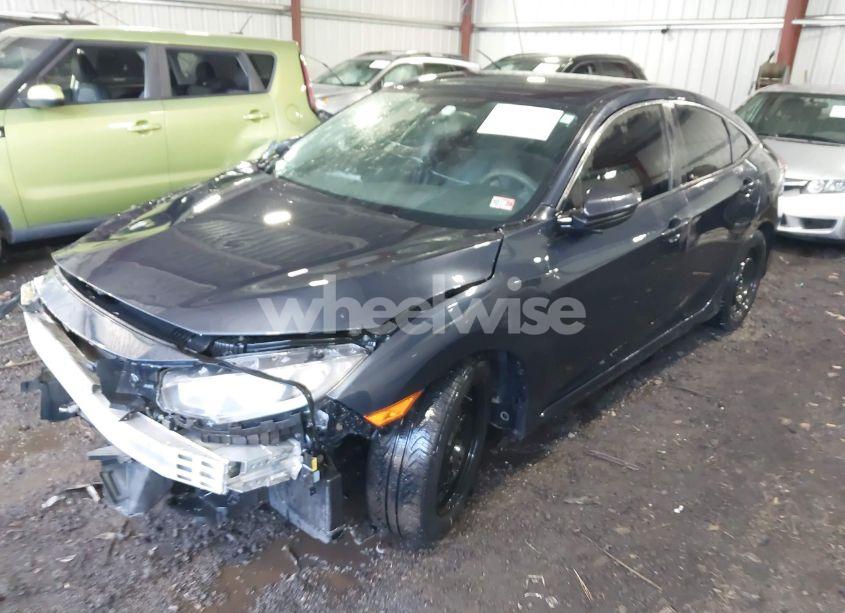 Photo 2 of 2017 Honda Civic LX (VIN 19XFC2F57HE050736)