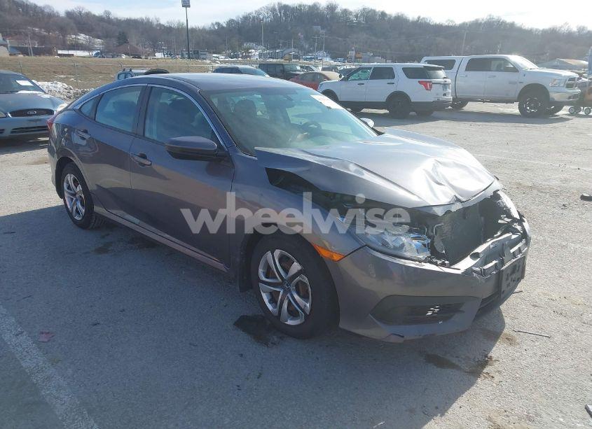 2017 Honda Civic LX (VIN 19XFC2F57HE052101) main photo