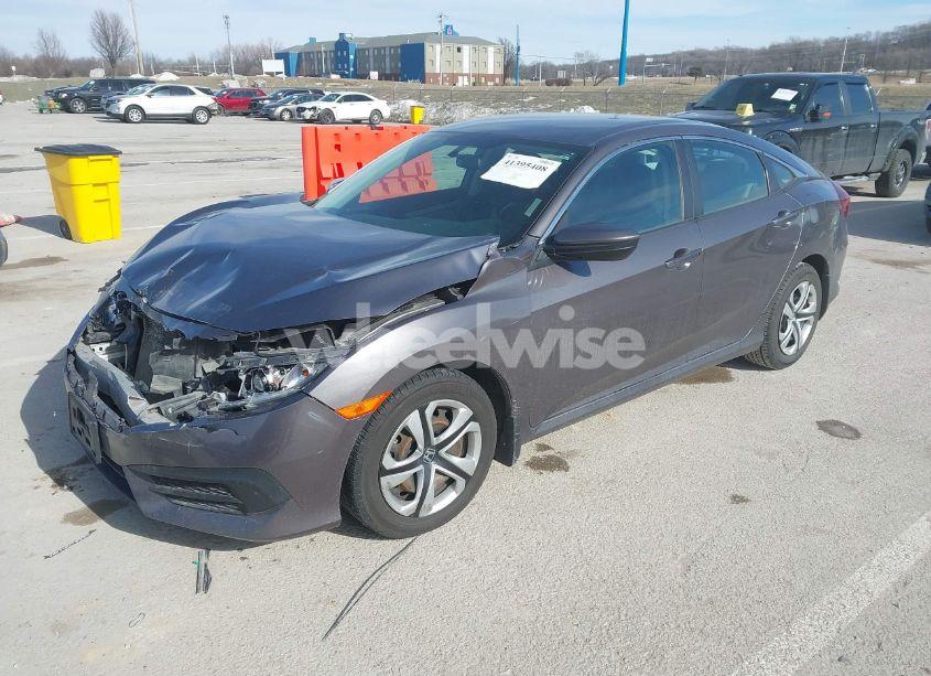 Photo 2 of 2017 Honda Civic LX (VIN 19XFC2F57HE052101)