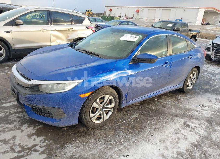 Photo 2 of 2017 Honda Civic LX (VIN 19XFC2F57HE055340)