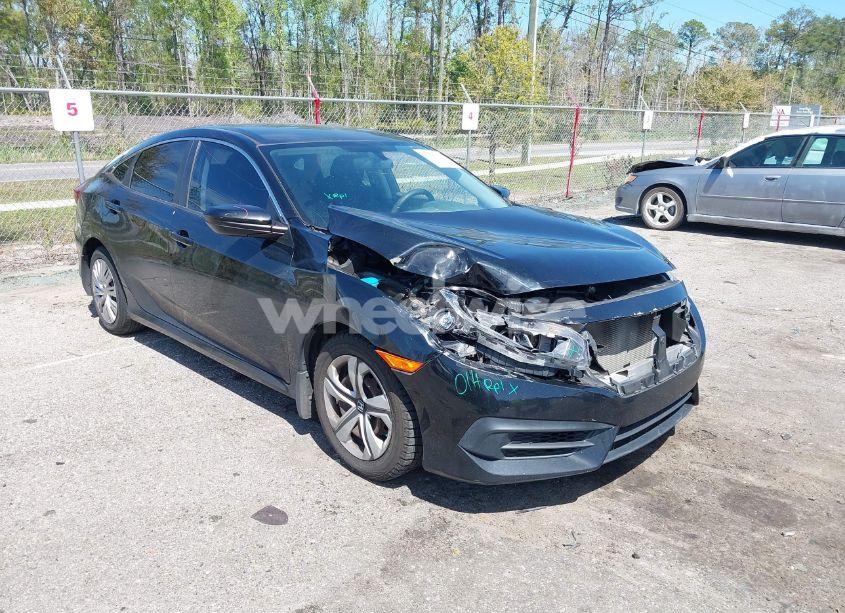 2017 Honda Civic LX (VIN 19XFC2F57HE061090) main photo